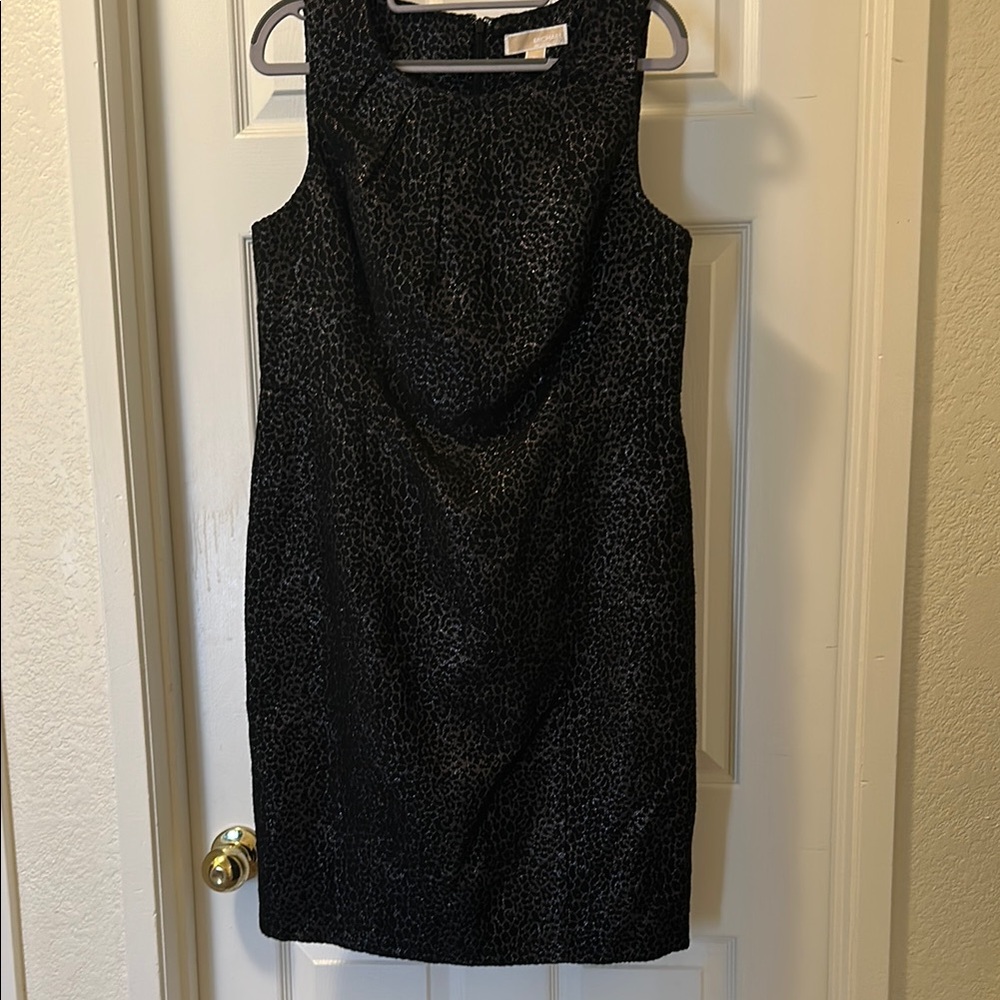 Black Michael Kors cocktail dress.